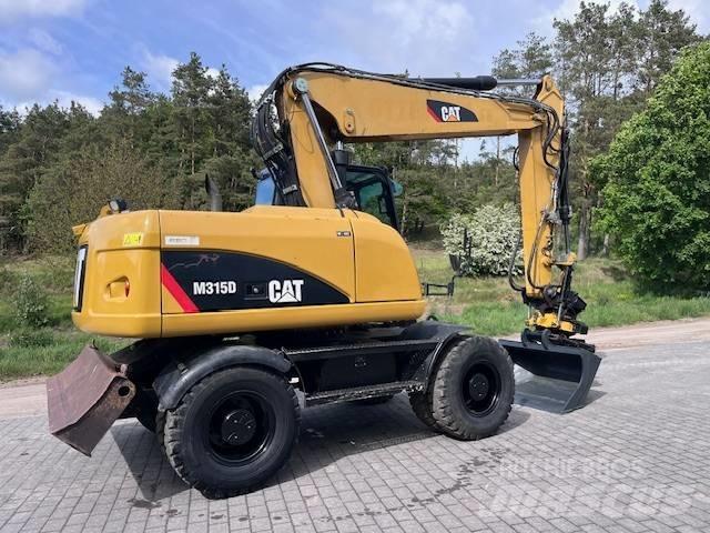 CAT M 315 D Колісні екскаватори
