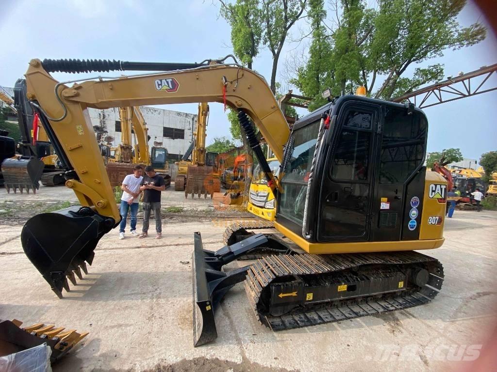 CAT 307 E Середні екскаватори 7т. - 12т.