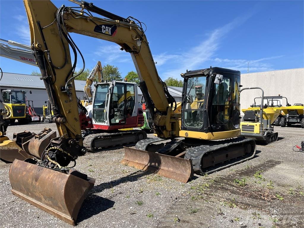 CAT 308 D Середні екскаватори 7т. - 12т.