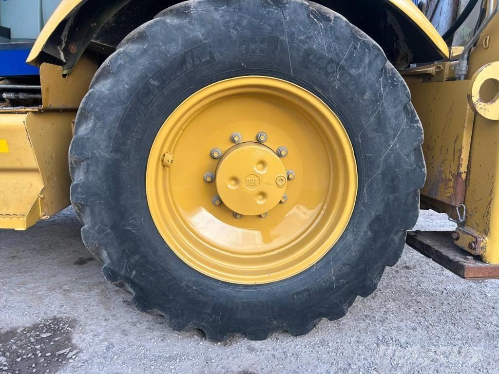 CAT 442 E Екскаватори-навантажувачі