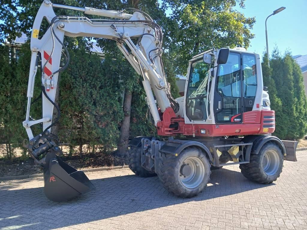 Takeuchi TB 295 W Колісні екскаватори