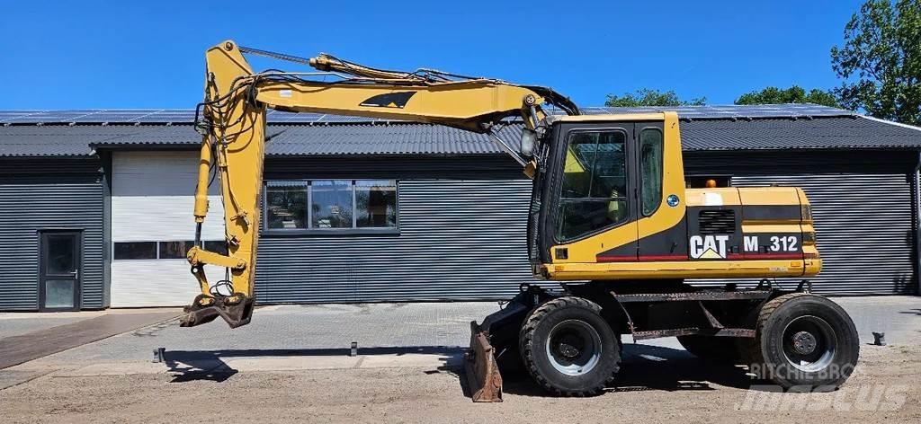 CAT M312 Колісні екскаватори