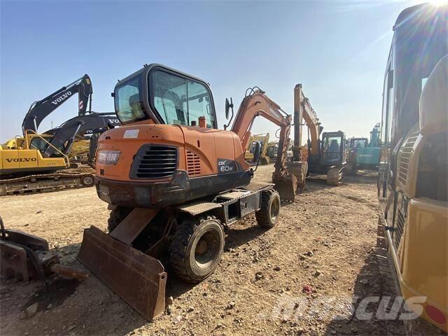 Doosan DX60W Гусеничні екскаватори