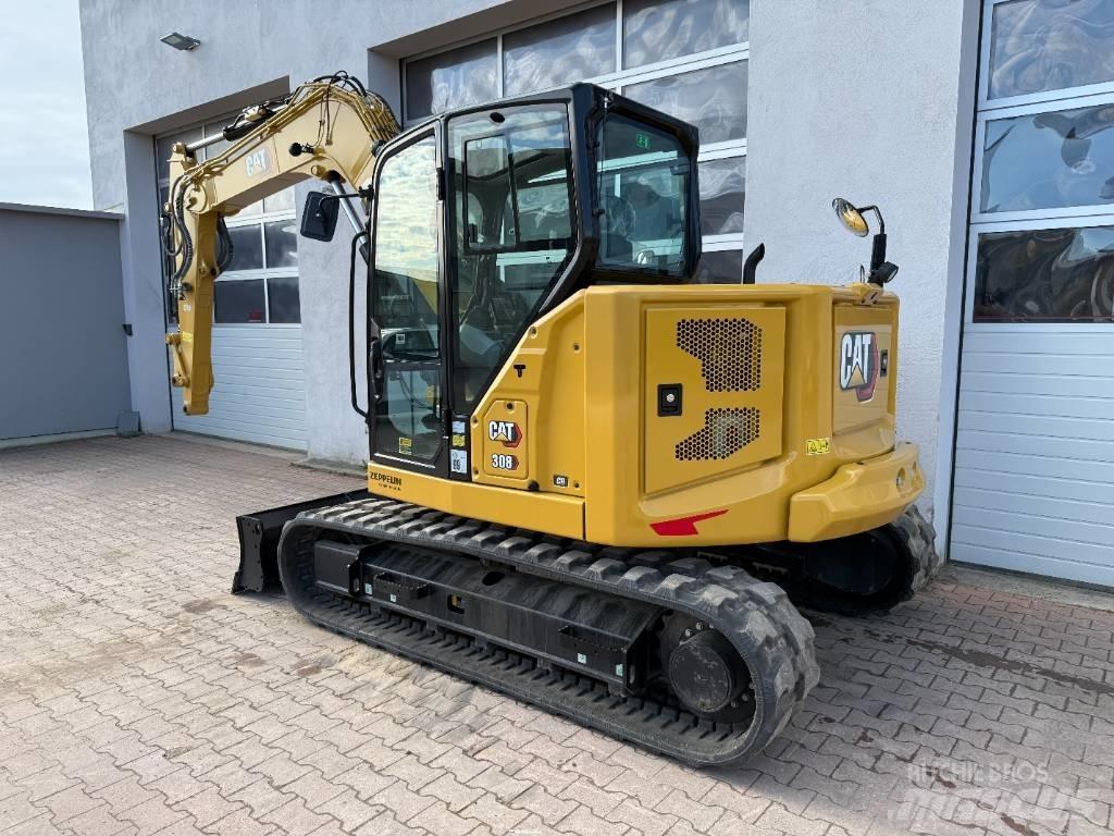 CAT 308 CR Середні екскаватори 7т. - 12т.