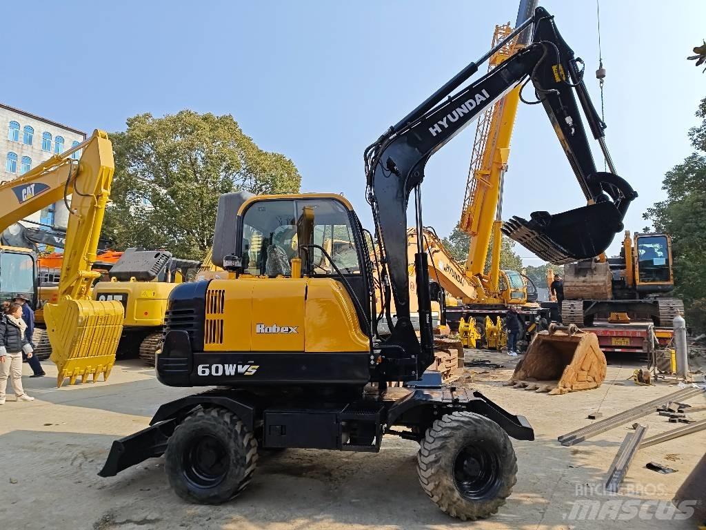 Hyundai 60W-9 Колісні екскаватори