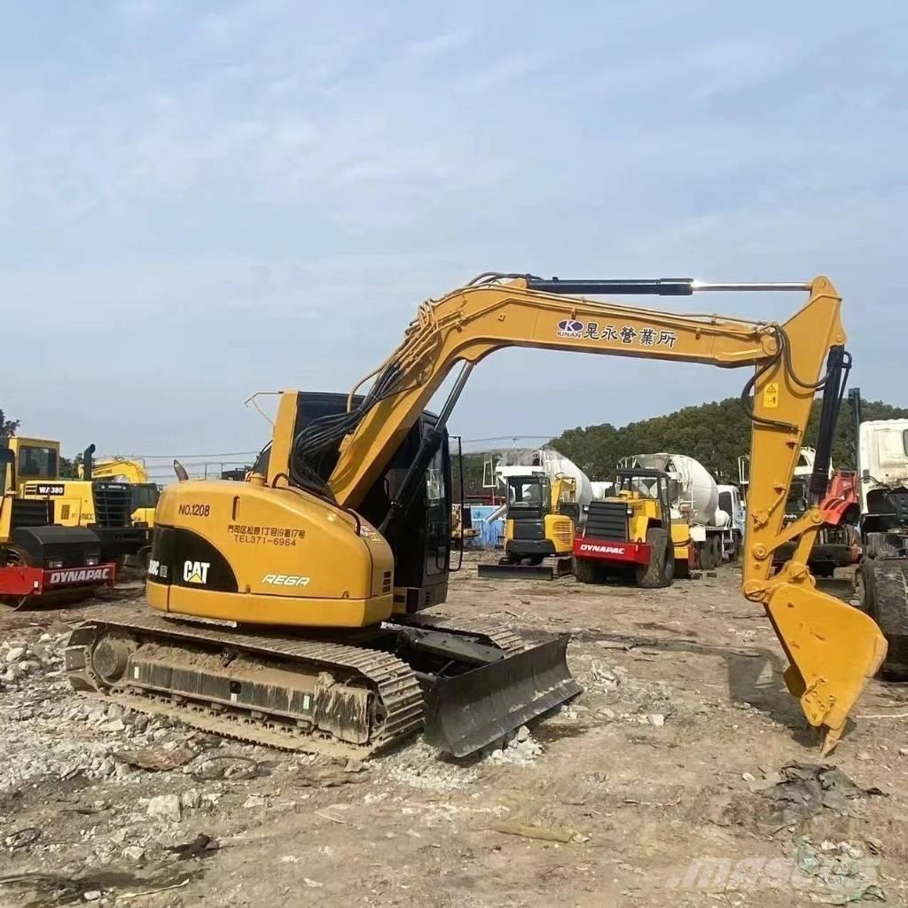 CAT 308C Середні екскаватори 7т. - 12т.
