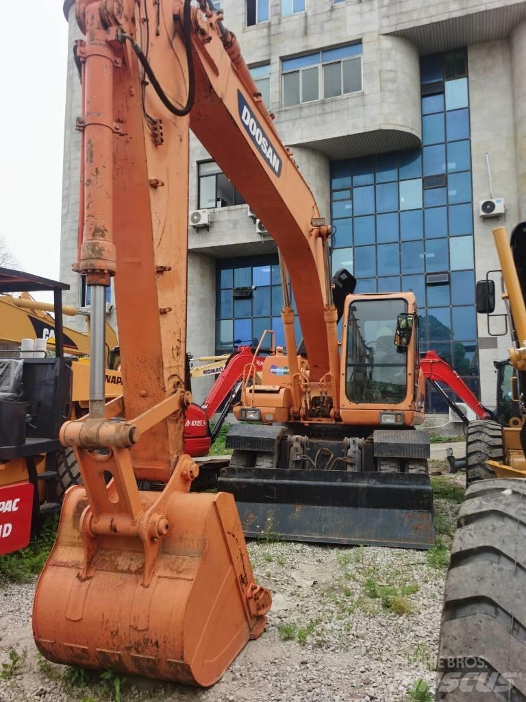 Doosan DH 210 W-7 Колісні екскаватори