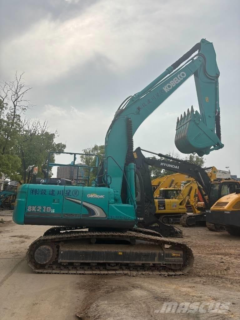 Kobelco SK 210 Гусеничні екскаватори