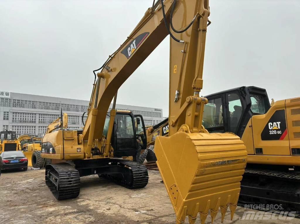 CAT 325 C Гусеничні екскаватори
