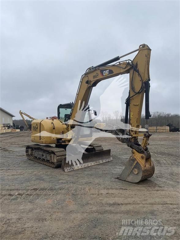 CAT 308E Гусеничні екскаватори