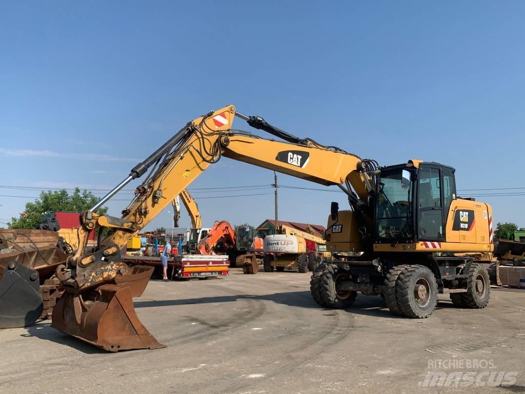 CAT M 318 F Колісні екскаватори