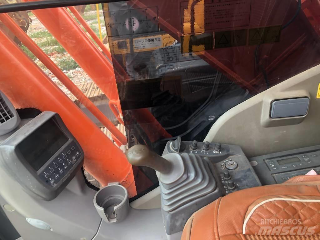 Hitachi ZX 240 Гусеничні екскаватори