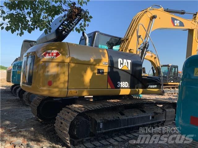 CAT 318DL Гусеничні екскаватори
