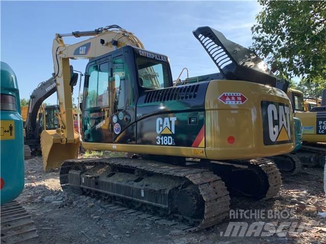 CAT 318DL Гусеничні екскаватори