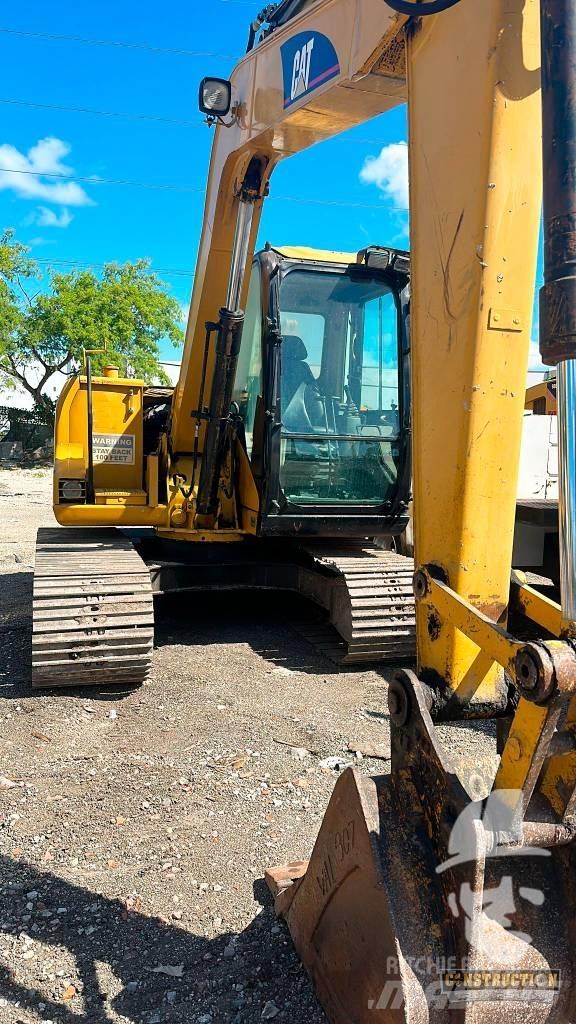CAT 307 C Гусеничні екскаватори