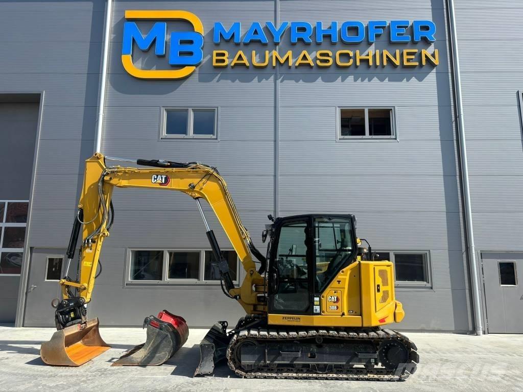 CAT 308 Середні екскаватори 7т. - 12т.