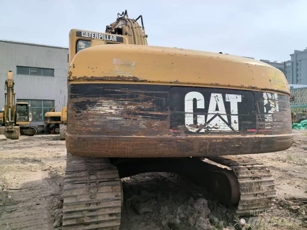 CAT 320 C Гусеничні екскаватори