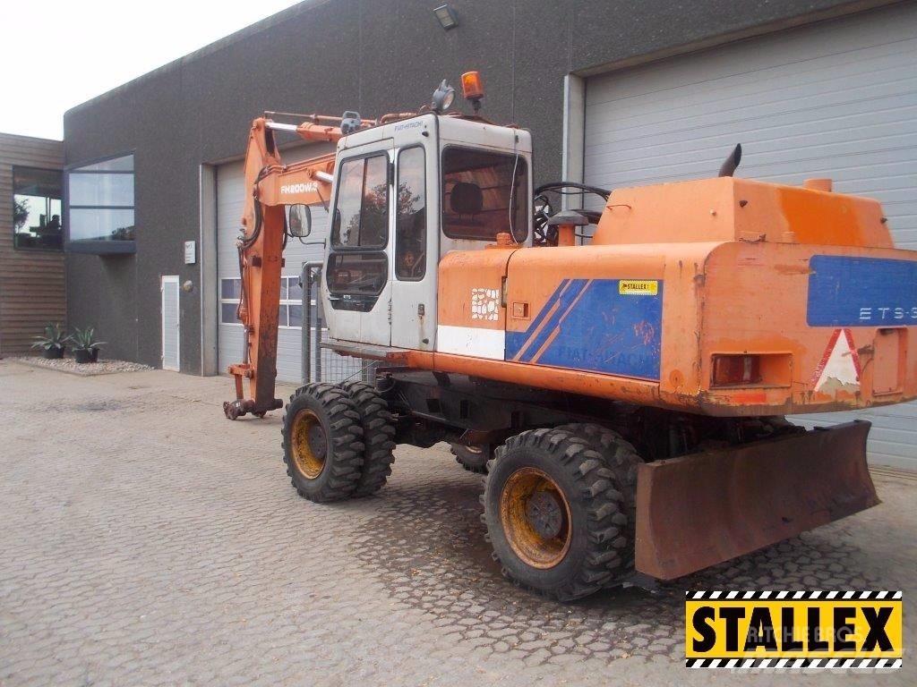 Hitachi 200W Колісні екскаватори
