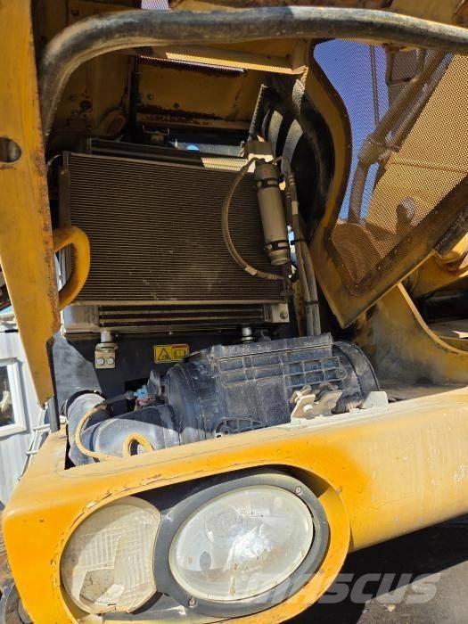 CAT M 313 D Колісні екскаватори