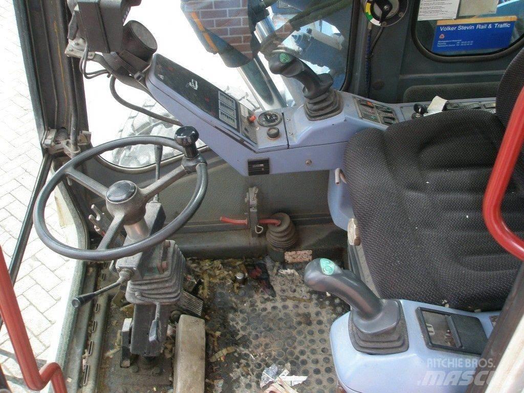 Atlas 1404 Колісні екскаватори