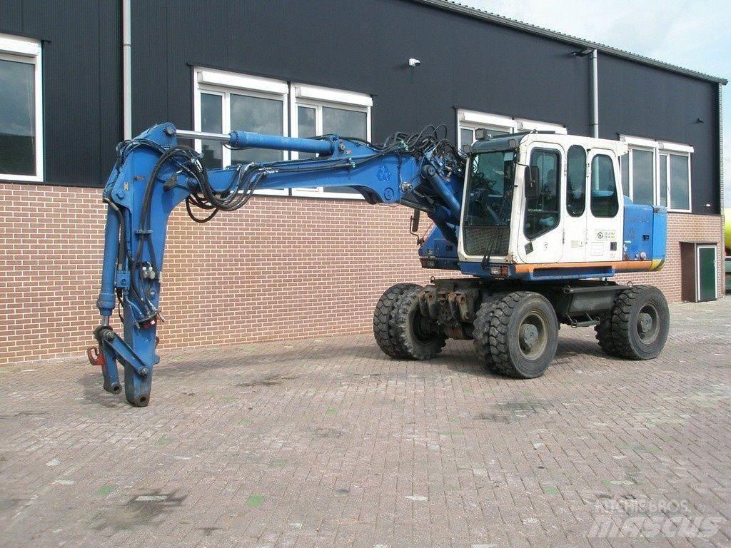 Atlas 1404 Колісні екскаватори