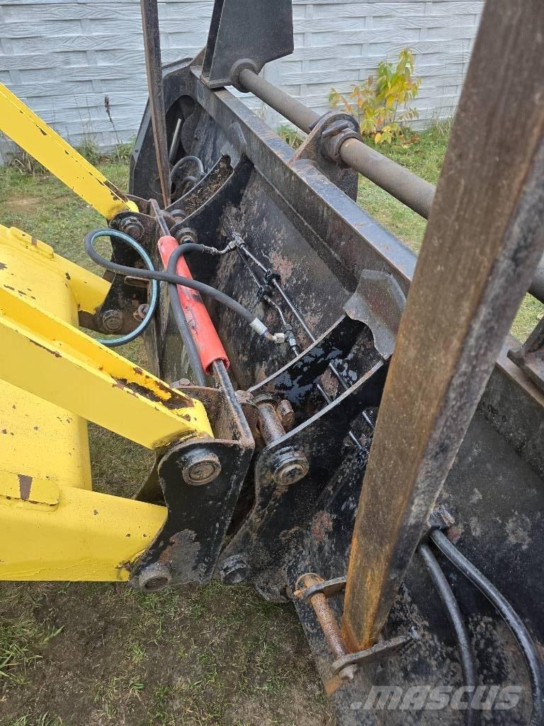 New Holland 115 Екскаватори-навантажувачі