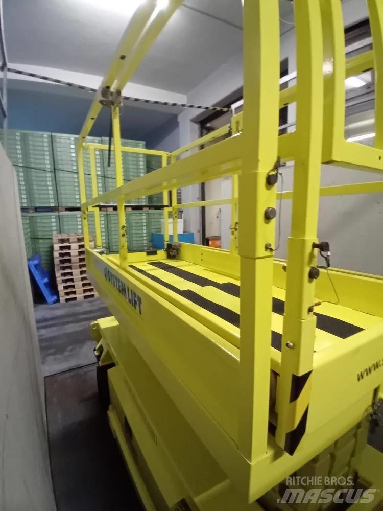 Holland Lift HL-9710 Підйомники-ножиці