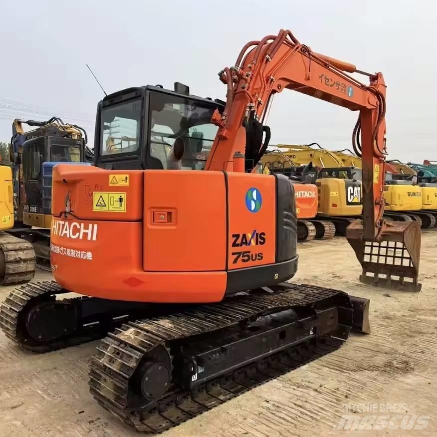 Hitachi ZX 75 US Середні екскаватори 7т. - 12т.