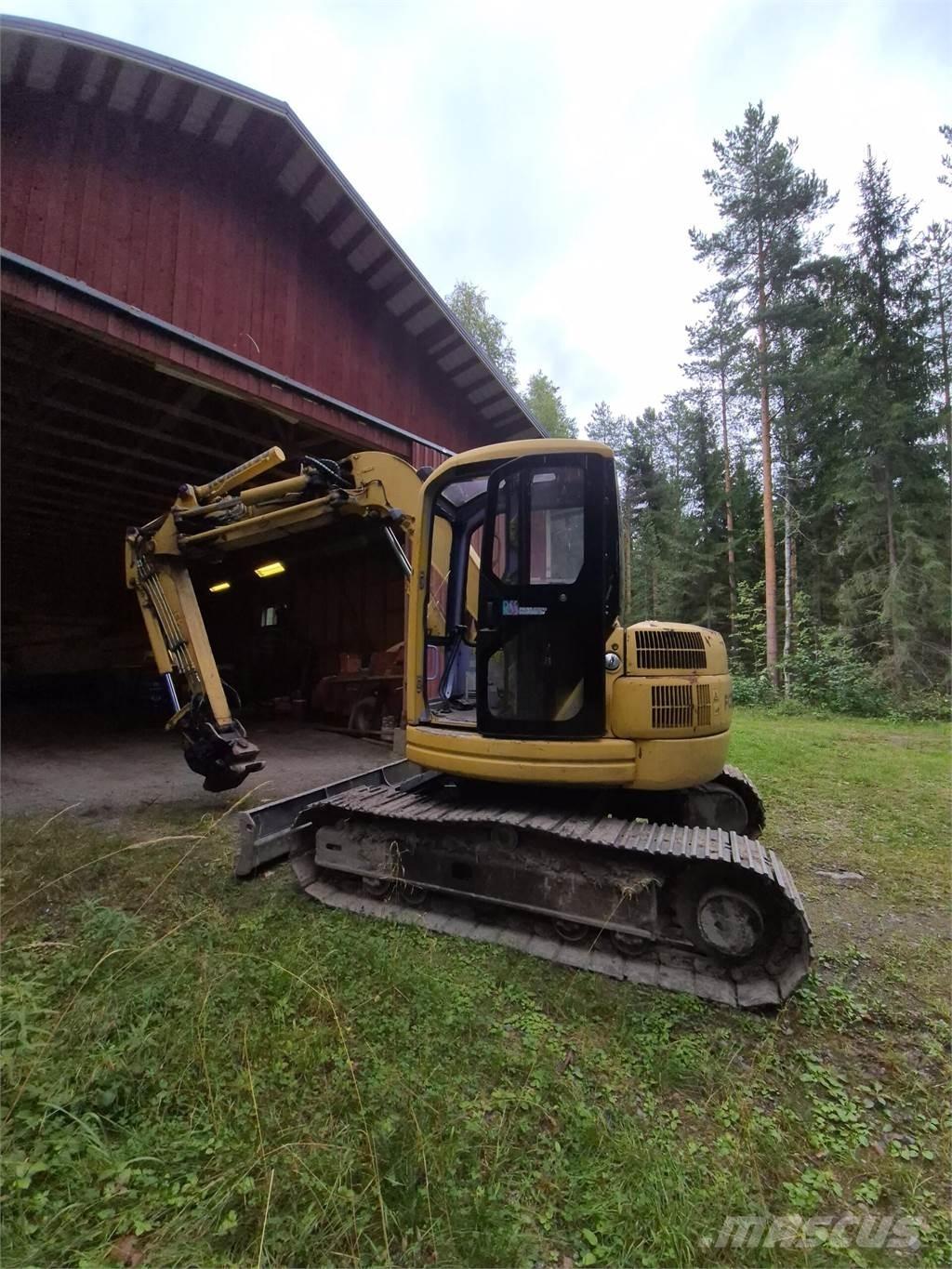 Komatsu PC75 UU Гусеничні екскаватори