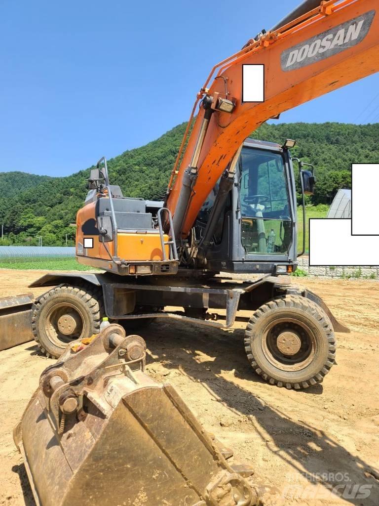 Doosan DX 140 W Колісні екскаватори
