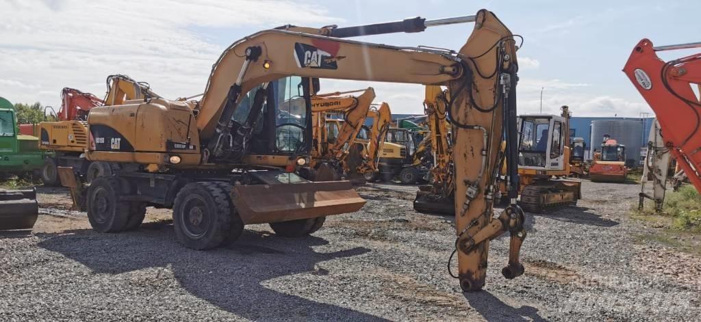 CAT M 315 D Колісні екскаватори