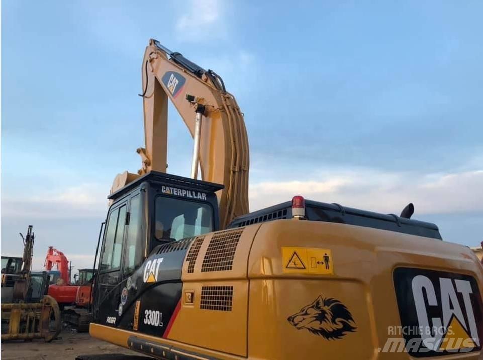 CAT 330DL Гусеничні екскаватори
