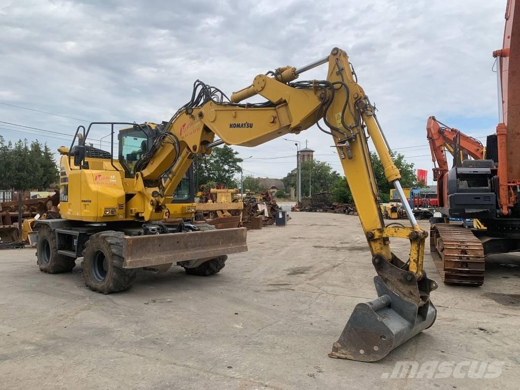 Komatsu PW118MR-11W Колісні екскаватори