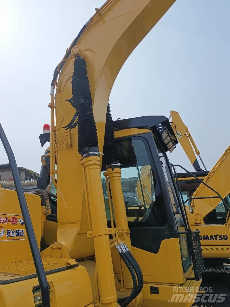 Komatsu PC130 Гусеничні екскаватори