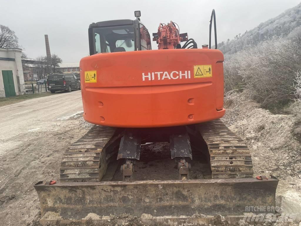 Hitachi ZX 135 US Гусеничні екскаватори
