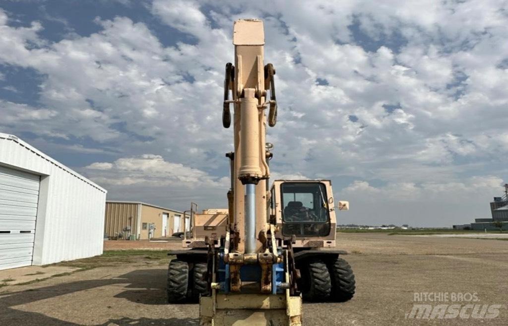 John Deere 595 Колісні екскаватори