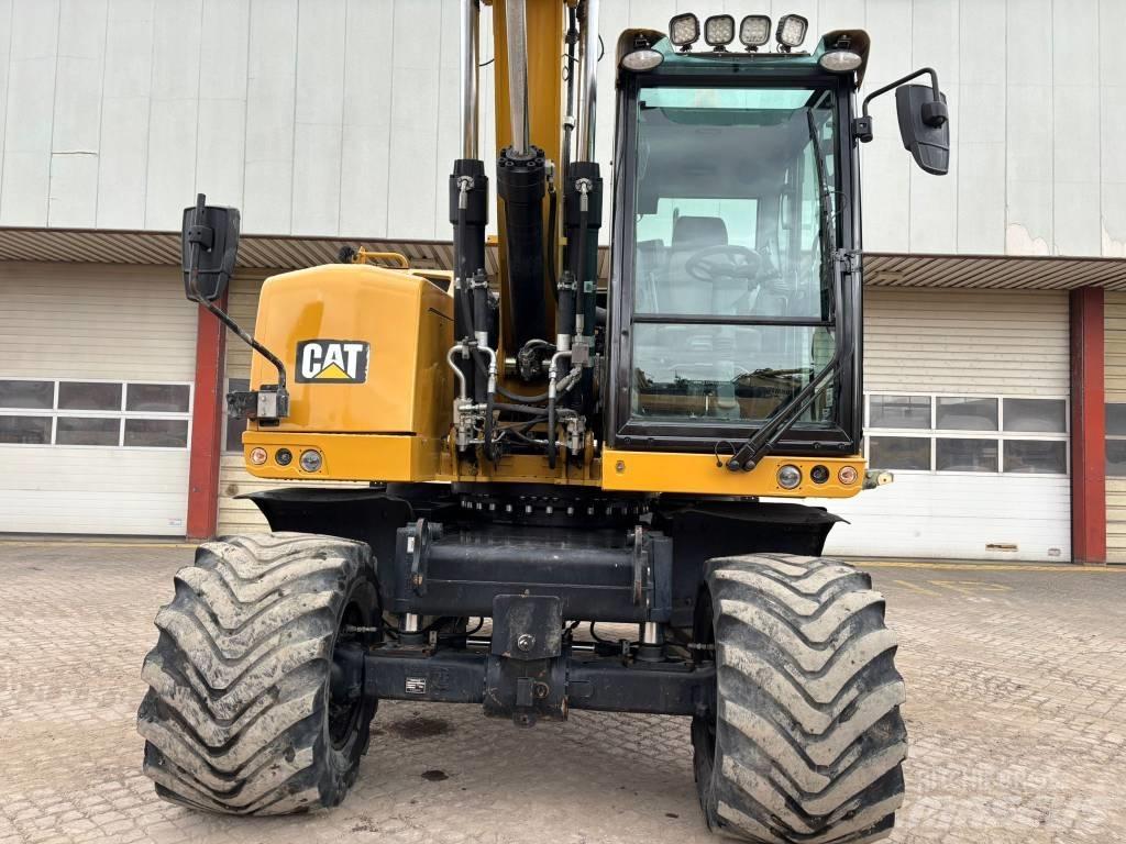 CAT M 318 F Колісні екскаватори