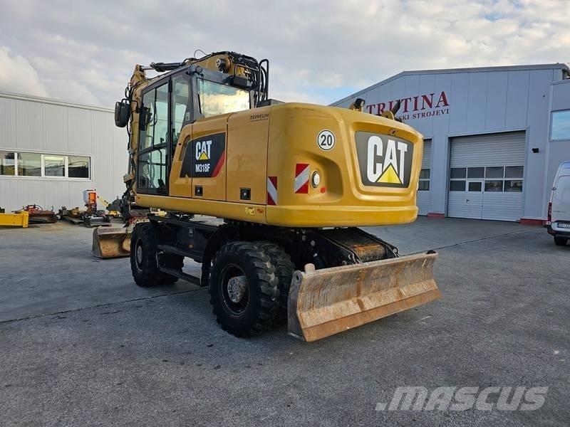 CAT M 318 F Колісні екскаватори