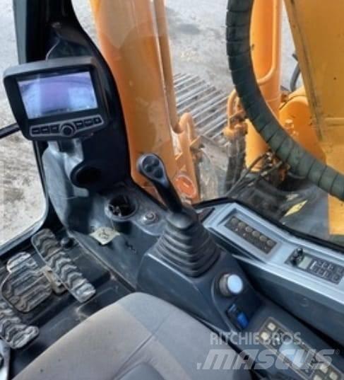CAT 323 E Гусеничні екскаватори