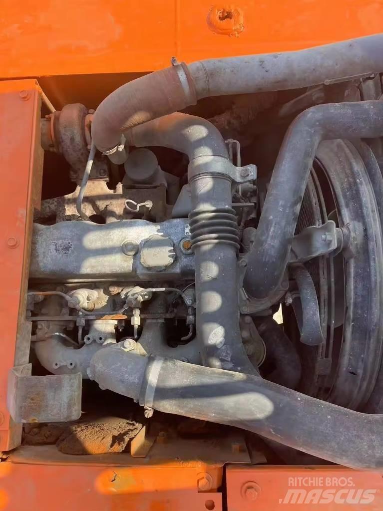 Hitachi ZX 120 Гусеничні екскаватори