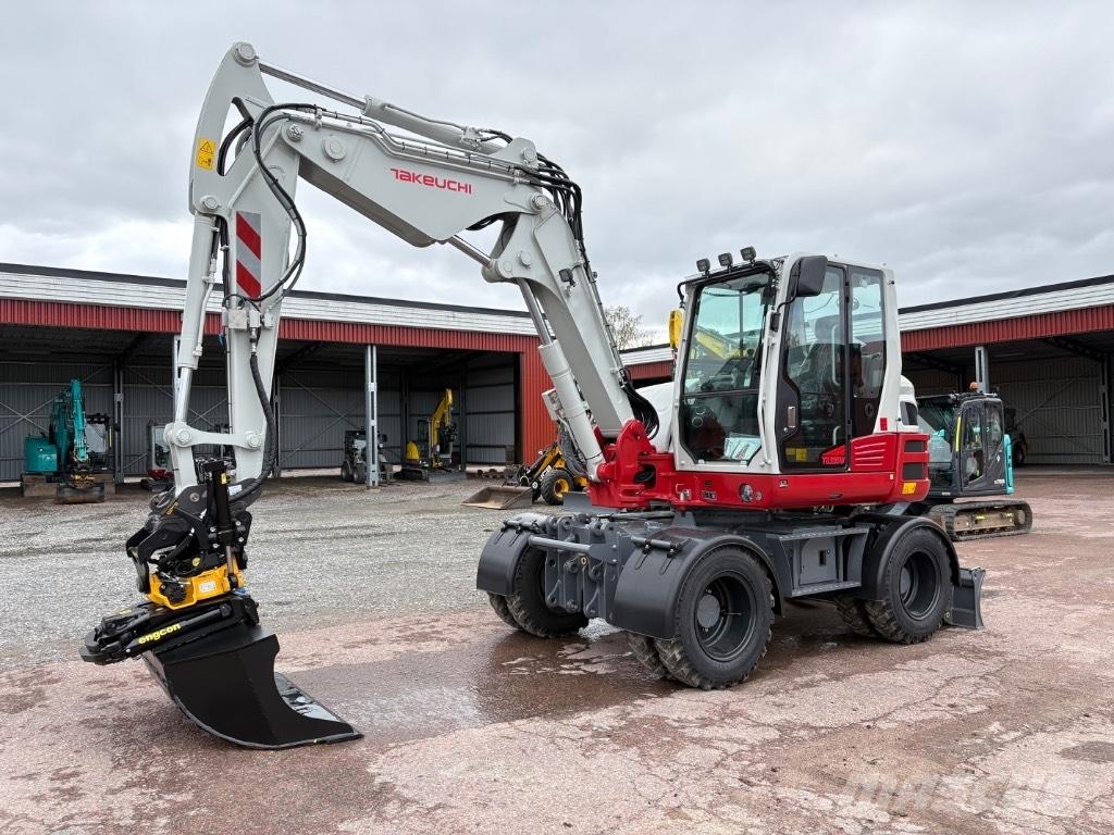 Takeuchi TB395W Колісні екскаватори