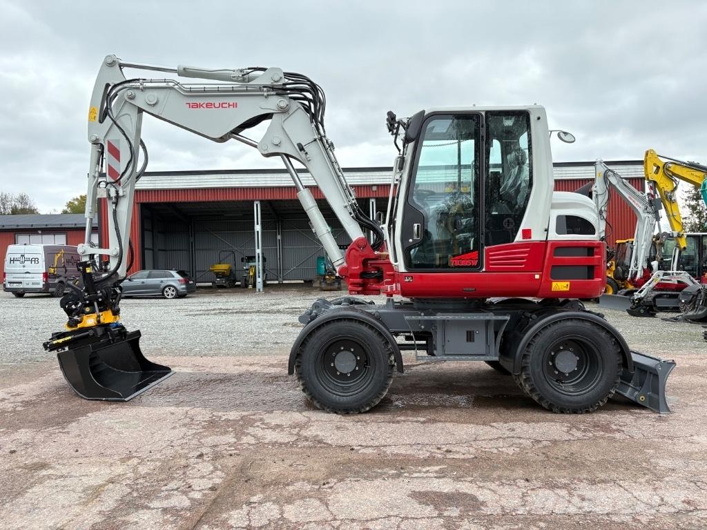 Takeuchi TB395W Колісні екскаватори