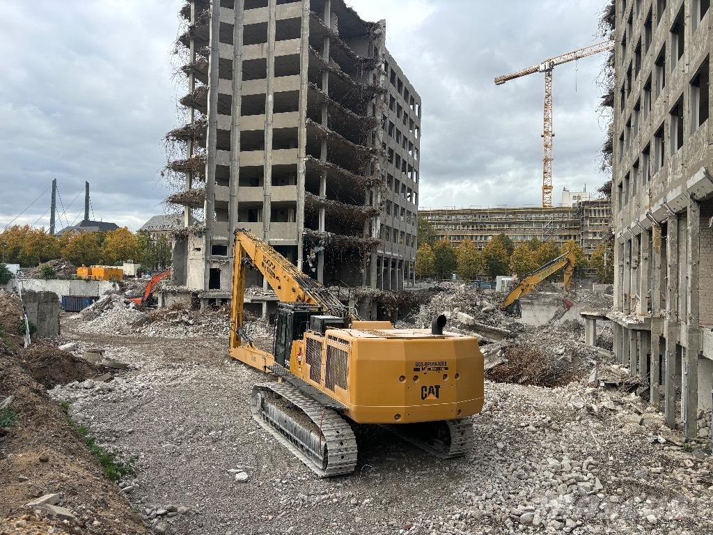 CAT 385 B UHD Екскаватори для знесення споруд