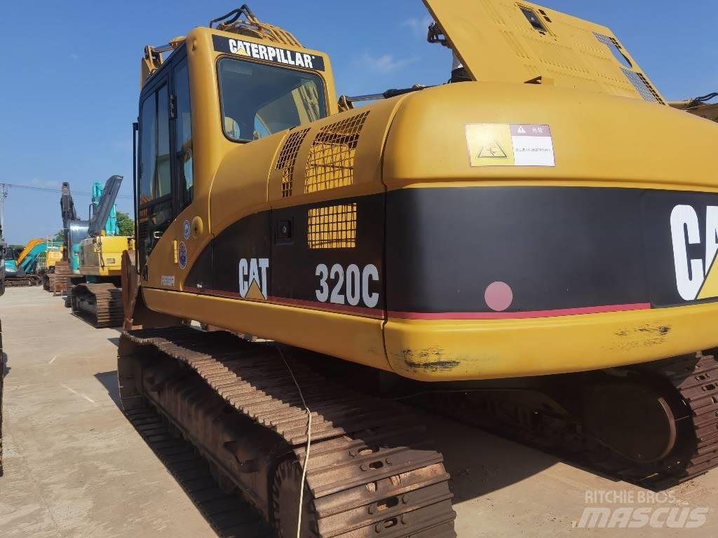 CAT 320 C Гусеничні екскаватори