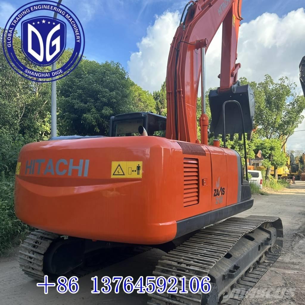Hitachi 210LC Гусеничні екскаватори
