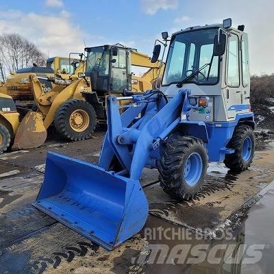 Hitachi LX 20-7 Фронтальні навантажувачі
