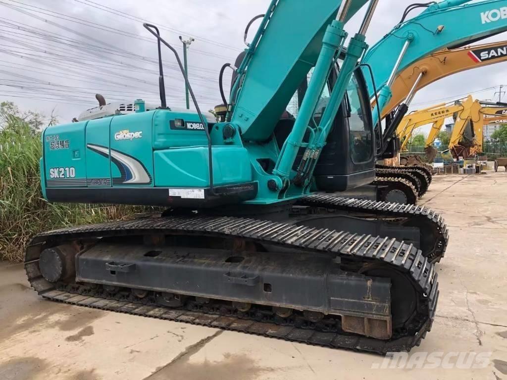 Kobelco SK 210 Гусеничні екскаватори