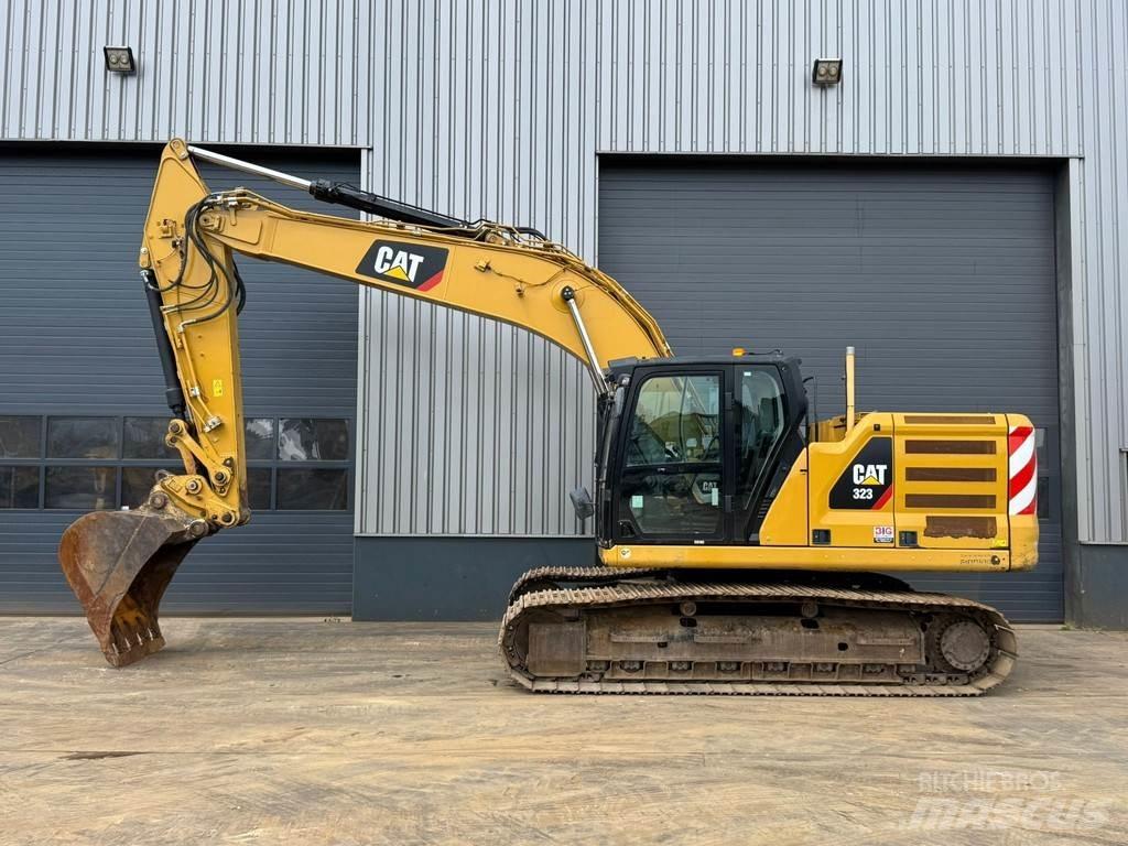 CAT 323 Гусеничні екскаватори