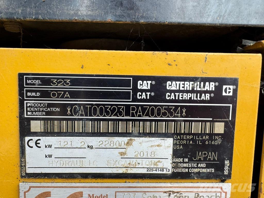 CAT 323 Гусеничні екскаватори