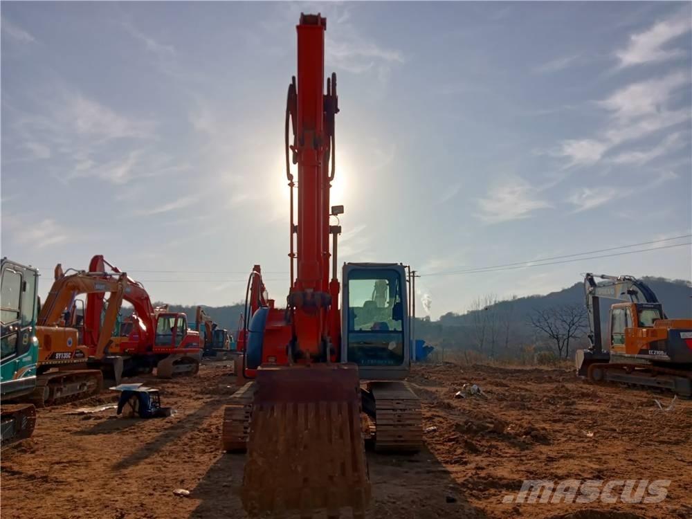 Hitachi ZX135US Гусеничні екскаватори